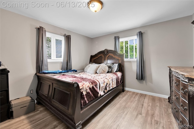 24113 Karen Ave, Warren, MI 48091 - bedroom with light wood-style flooring and baseboards