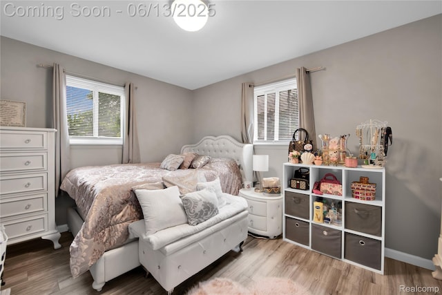 24113 Karen Ave, Warren, MI 48091 - bedroom with wood finished floors and baseboards