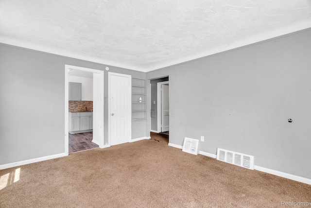 20069 Goulburn St, Detroit, MI 48205 - unfurnished bedroom featuring carpet, baseboards, and ensuite bathroom
