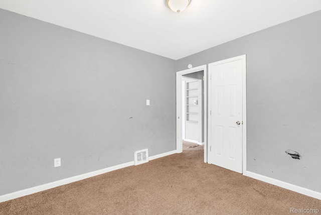 20069 Goulburn St, Detroit, MI 48205 - spare room with carpet flooring and baseboards