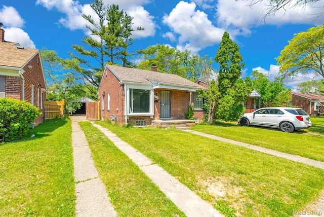 20069 Goulburn St, Detroit, MI 48205 - bungalow-style house featuring brick siding and a chimney
