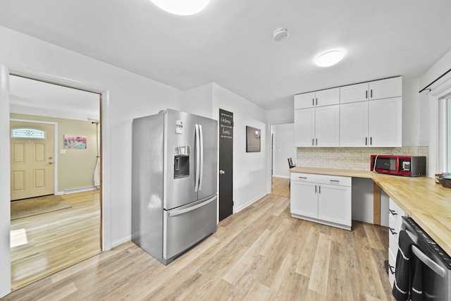 2618 Greencliff Dr, East Lansing, MI 48823 - kitchen with appliances with stainless steel finishes, light wood-type flooring, white cabinetry, and decorative backsplash