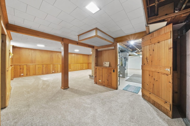 2618 Greencliff Dr, East Lansing, MI 48823 - finished basement with carpet floors, wood walls, and heating unit