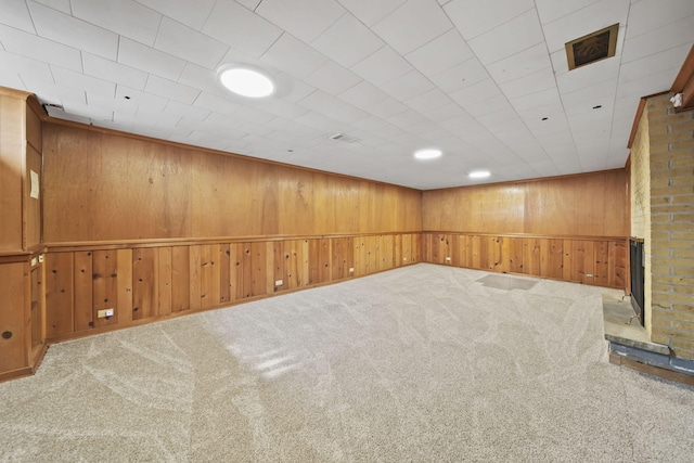 2618 Greencliff Dr, East Lansing, MI 48823 - finished below grade area with wooden walls, carpet, and a fireplace