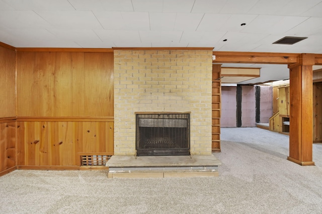 2618 Greencliff Dr, East Lansing, MI 48823 - unfurnished living room with carpet, wooden walls, and a fireplace