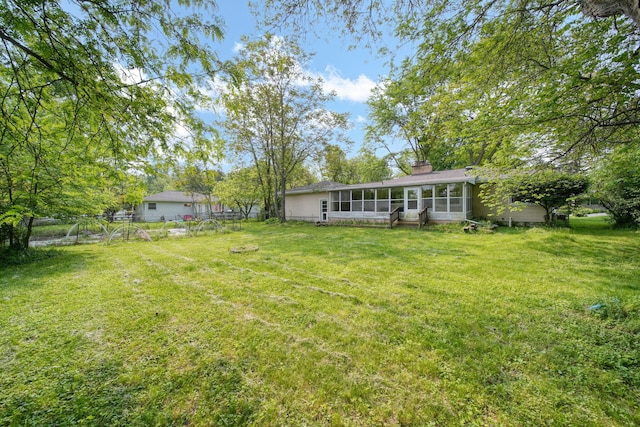 2618 Greencliff Dr, East Lansing, MI 48823 - view of yard featuring a sunroom