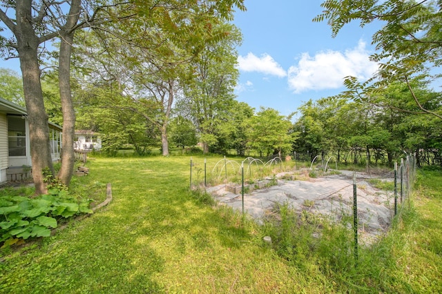 2618 Greencliff Dr, East Lansing, MI 48823 - view of green lawn with a vegetable garden