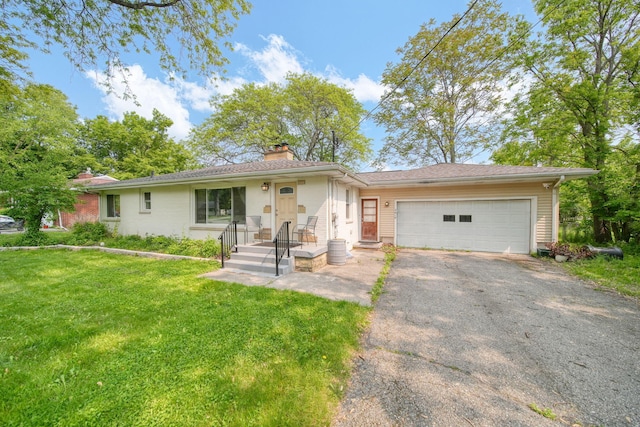 2618 Greencliff Dr, East Lansing, MI 48823 - ranch-style house featuring a chimney, driveway, an attached garage, and a front lawn