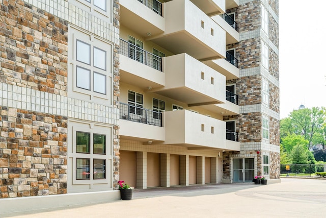 240 Water St Unit 1A, Saint Joseph, MI 49085 - view of apartment building / complex with an attached garage