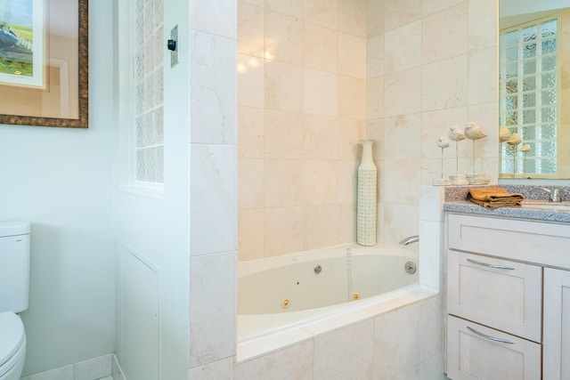 240 Water St Unit 1A, Saint Joseph, MI 49085 - full bath featuring toilet, a tub with jets, and vanity