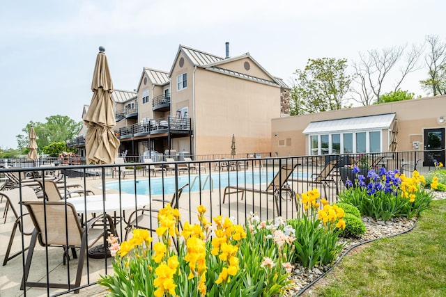 240 Water St Unit 1A, Saint Joseph, MI 49085 - community pool with a patio area