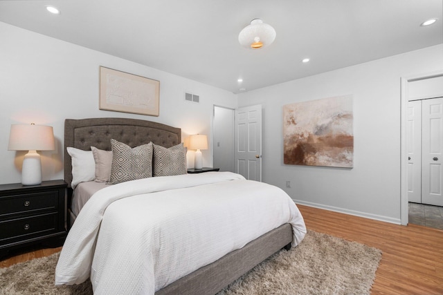 3673 Pheasant Dr, Ann Arbor, MI 48103 - bedroom with wood finished floors, baseboards, and recessed lighting