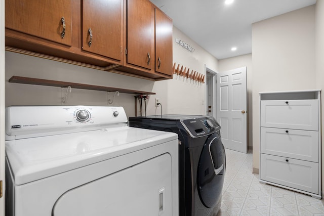 3673 Pheasant Dr, Ann Arbor, MI 48103 - laundry room with cabinet space, independent washer and dryer, light tile patterned floors, and recessed lighting