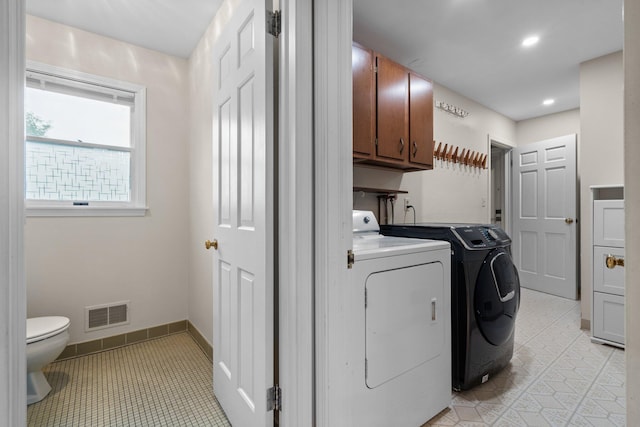 3673 Pheasant Dr, Ann Arbor, MI 48103 - laundry room with washing machine and clothes dryer, light tile patterned floors, recessed lighting, and baseboards