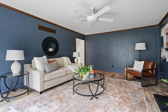 3673 Pheasant Dr, Ann Arbor, MI 48103 - living area featuring wood finished floors, crown molding, and a ceiling fan