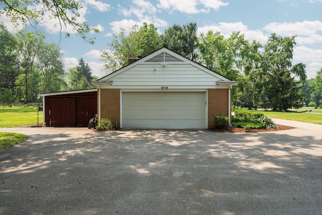 3673 Pheasant Dr, Ann Arbor, MI 48103 - garage with driveway