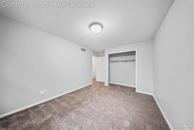 8487 Sherwood Dr, Grosse Ile, MI 48138 - unfurnished bedroom featuring carpet floors, baseboards, and a closet