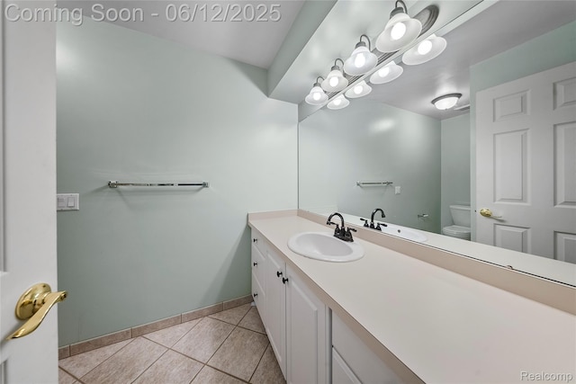 8487 Sherwood Dr, Grosse Ile, MI 48138 - bathroom featuring tile patterned flooring, toilet, vanity, and baseboards