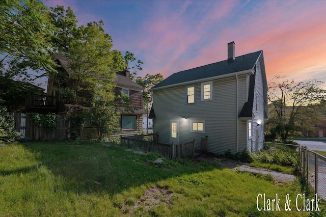 1714 Kalamazoo Ave SE, Grand Rapids, MI 49507 - rear view of property featuring a chimney
