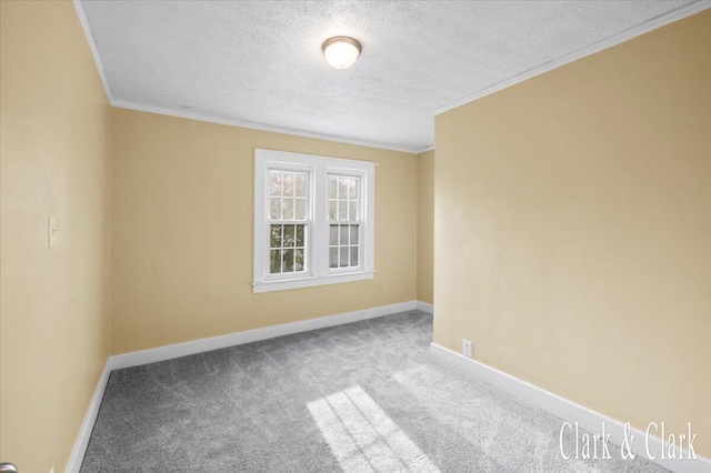 1714 Kalamazoo Ave SE, Grand Rapids, MI 49507 - empty room featuring ornamental molding, a textured ceiling, carpet floors, and baseboards