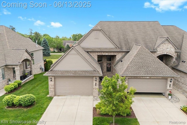 5624 Knob Hill Cir, Clarkston, MI 48348 - french provincial home featuring driveway, brick siding, a front yard, and a shingled roof