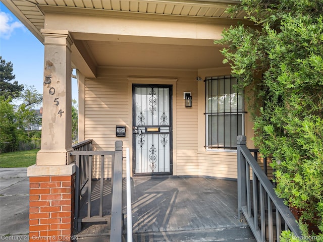 3054 Cadillac Blvd, Redford, MI 48214 - doorway to property with covered porch