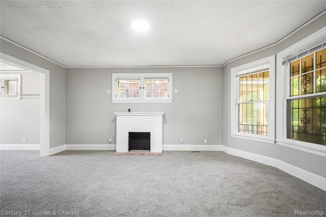 3054 Cadillac Blvd, Redford, MI 48214 - unfurnished living room featuring carpet flooring, a brick fireplace, a textured ceiling, and baseboards