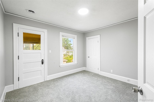 3054 Cadillac Blvd, Redford, MI 48214 - carpeted entryway with baseboards and ornamental molding