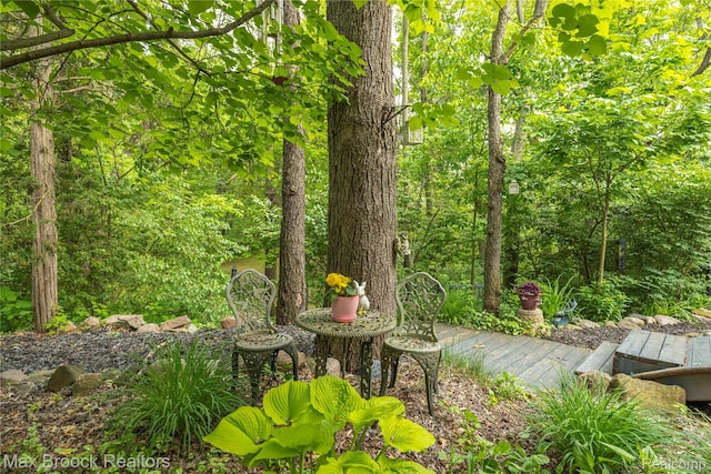 1982 E Coon Lake Rd, Howell, MI 48843 - view of yard with a wooden deck