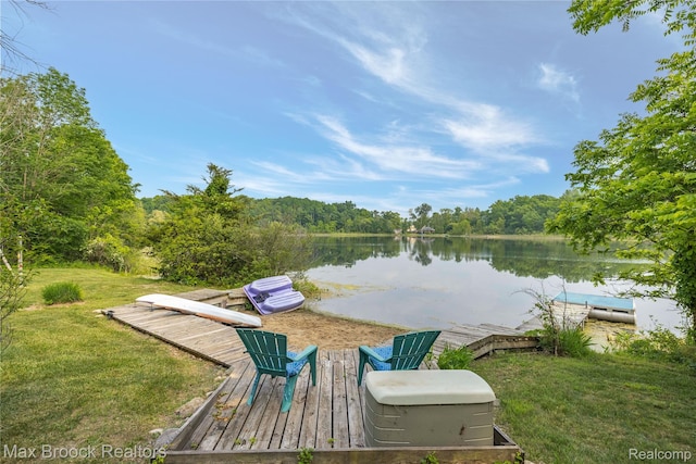 1982 E Coon Lake Rd, Howell, MI 48843 - dock area featuring a water view, a lawn, and a wooded view