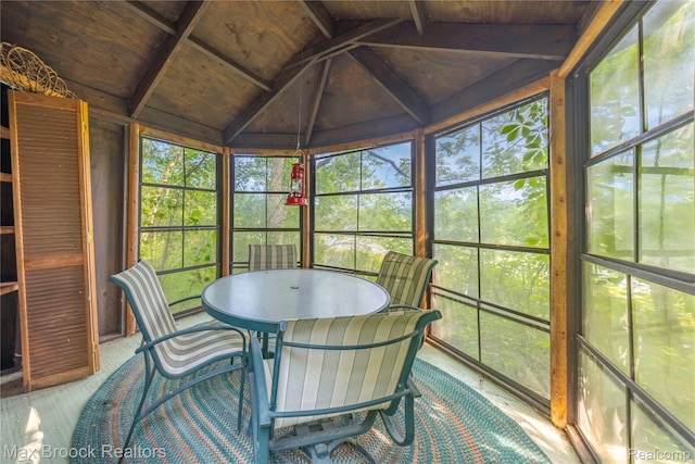 1982 E Coon Lake Rd, Howell, MI 48843 - sunroom / solarium with vaulted ceiling and outdoor dining area
