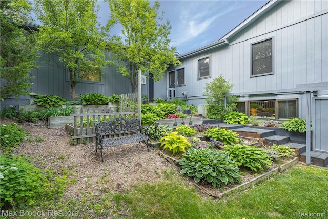 1982 E Coon Lake Rd, Howell, MI 48843 - view of yard featuring a vegetable garden