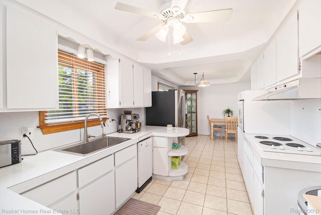 2095 Garry Dr, Troy, MI 48083 - kitchen with white appliances, white cabinets, light countertops, light tile patterned floors, and a ceiling fan