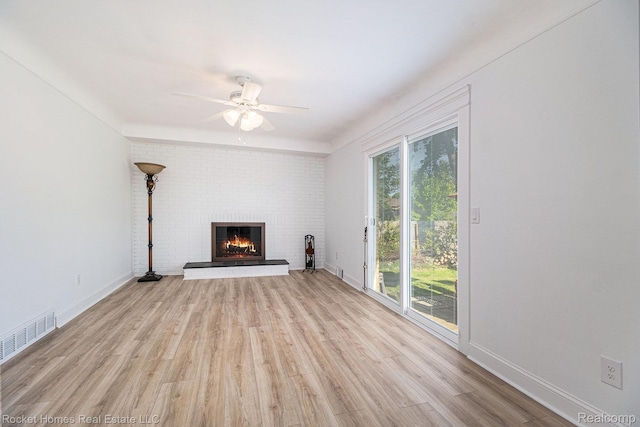 2095 Garry Dr, Troy, MI 48083 - unfurnished living room featuring a fireplace, wood finished floors, and ceiling fan