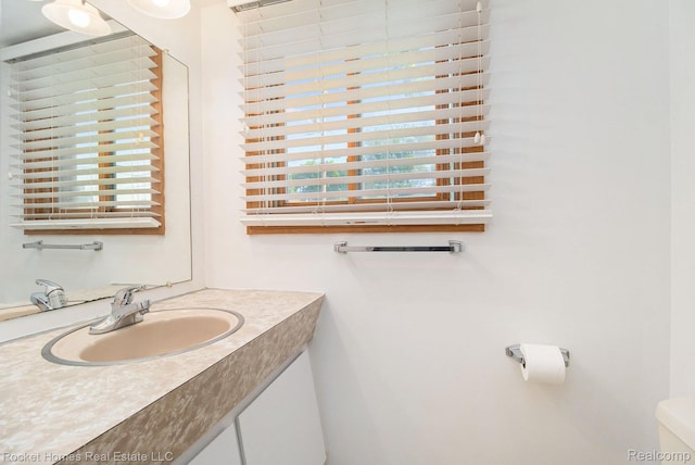 2095 Garry Dr, Troy, MI 48083 - half bath with vanity and toilet