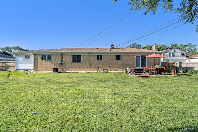 2095 Garry Dr, Troy, MI 48083 - rear view of house featuring brick siding and a patio