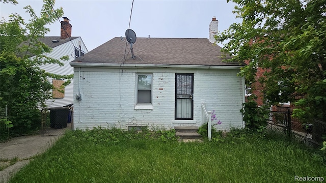 19610 Westphalia St, Detroit, MI 48205 - back of property with brick siding and roof with shingles