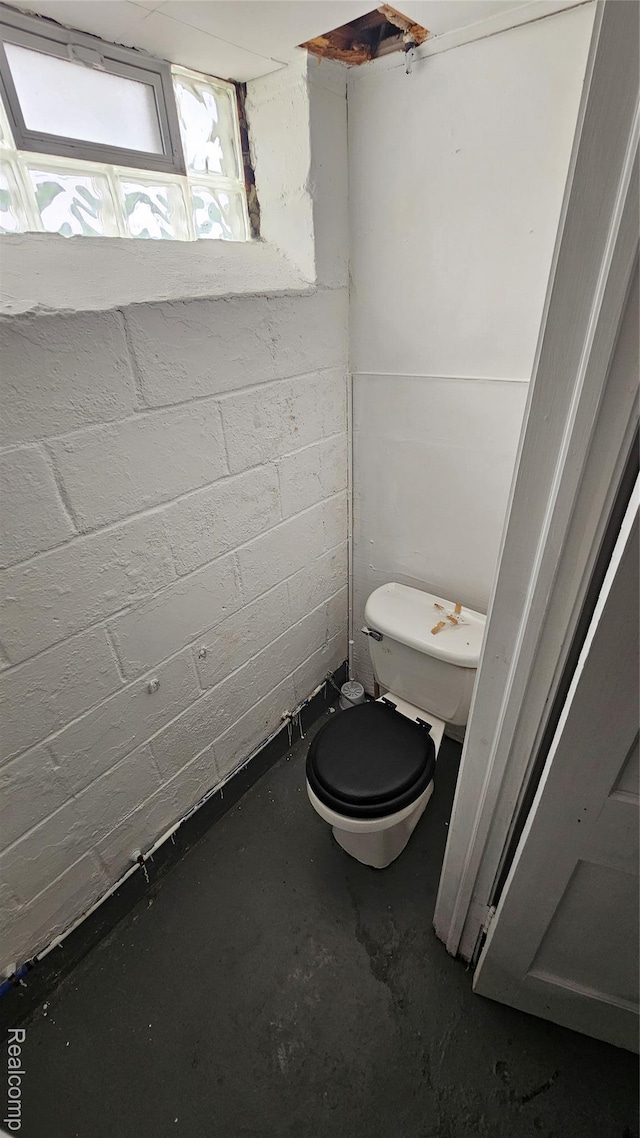 19610 Westphalia St, Detroit, MI 48205 - bathroom featuring unfinished concrete floors and toilet