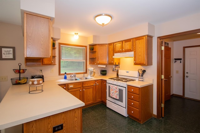 10926 Gorsline Rd, Battle Creek, MI 49014 - kitchen featuring white range with gas stovetop, under cabinet range hood, open shelves, light countertops, and brown cabinets