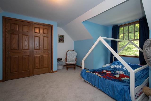 10926 Gorsline Rd, Battle Creek, MI 49014 - bedroom featuring carpet floors, lofted ceiling, and baseboards