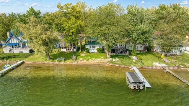 194 Pentecost Hwy, Onsted, MI 49265 - dock area featuring a water view, a yard, and view of scattered trees