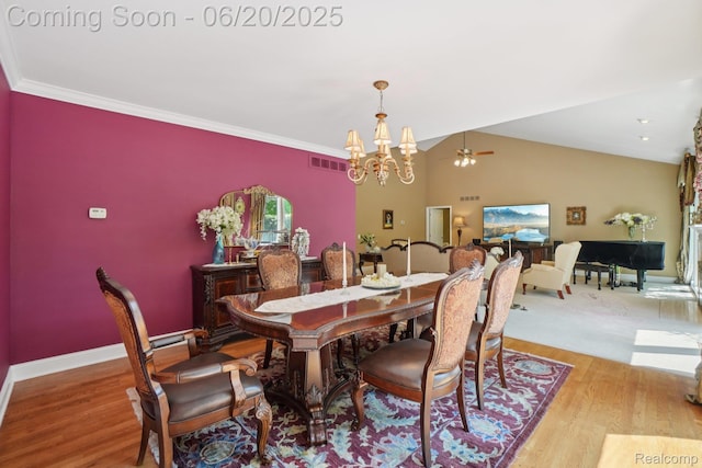 4541 Rivers Edge, Troy, MI 48098 - dining area with light wood finished floors, a chandelier, and lofted ceiling
