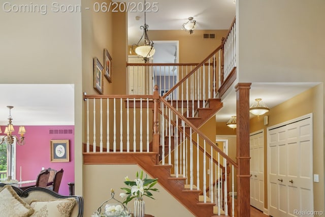4541 Rivers Edge, Troy, MI 48098 - stairway with a chandelier