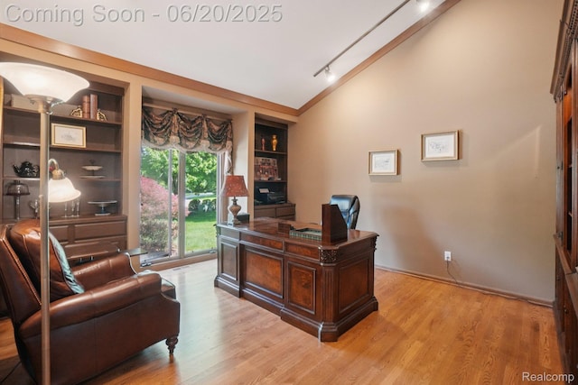 4541 Rivers Edge, Troy, MI 48098 - office area featuring lofted ceiling, light wood-style flooring, built in shelves, and rail lighting