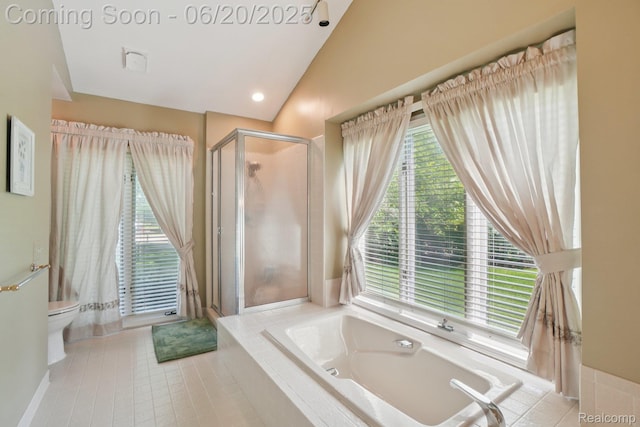 4541 Rivers Edge, Troy, MI 48098 - bathroom featuring lofted ceiling, a shower stall, a garden tub, and tile patterned floors