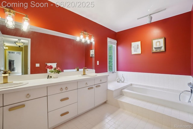4541 Rivers Edge, Troy, MI 48098 - full bathroom with double vanity, tile patterned flooring, a garden tub, and rail lighting