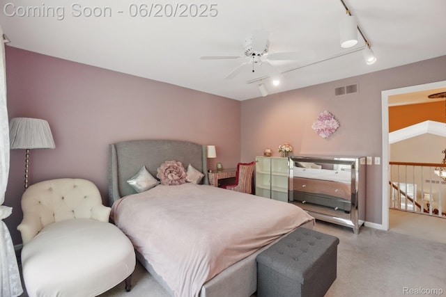 4541 Rivers Edge, Troy, MI 48098 - carpeted bedroom with rail lighting and a ceiling fan