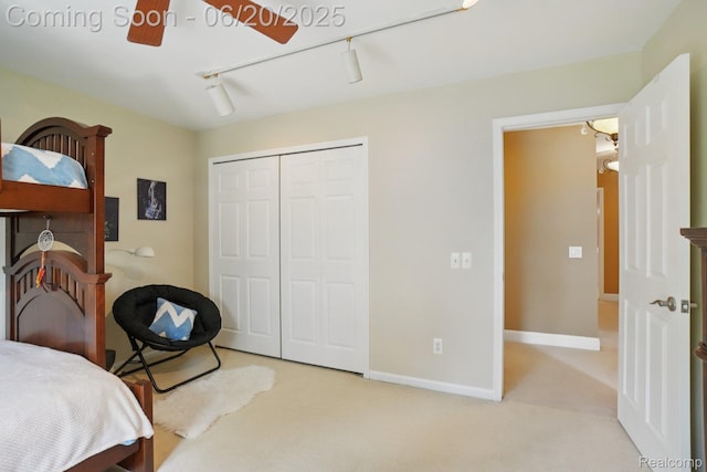4541 Rivers Edge, Troy, MI 48098 - bedroom featuring light carpet, track lighting, a closet, and ceiling fan