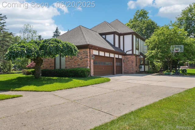 4541 Rivers Edge, Troy, MI 48098 - view of side of property featuring brick siding, a lawn, concrete driveway, roof with shingles, and an attached garage