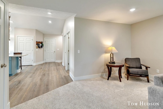 158 Brewer Park Cir, Grand Rapids, MI 49548 - living area with baseboards, recessed lighting, lofted ceiling, and light wood-style flooring